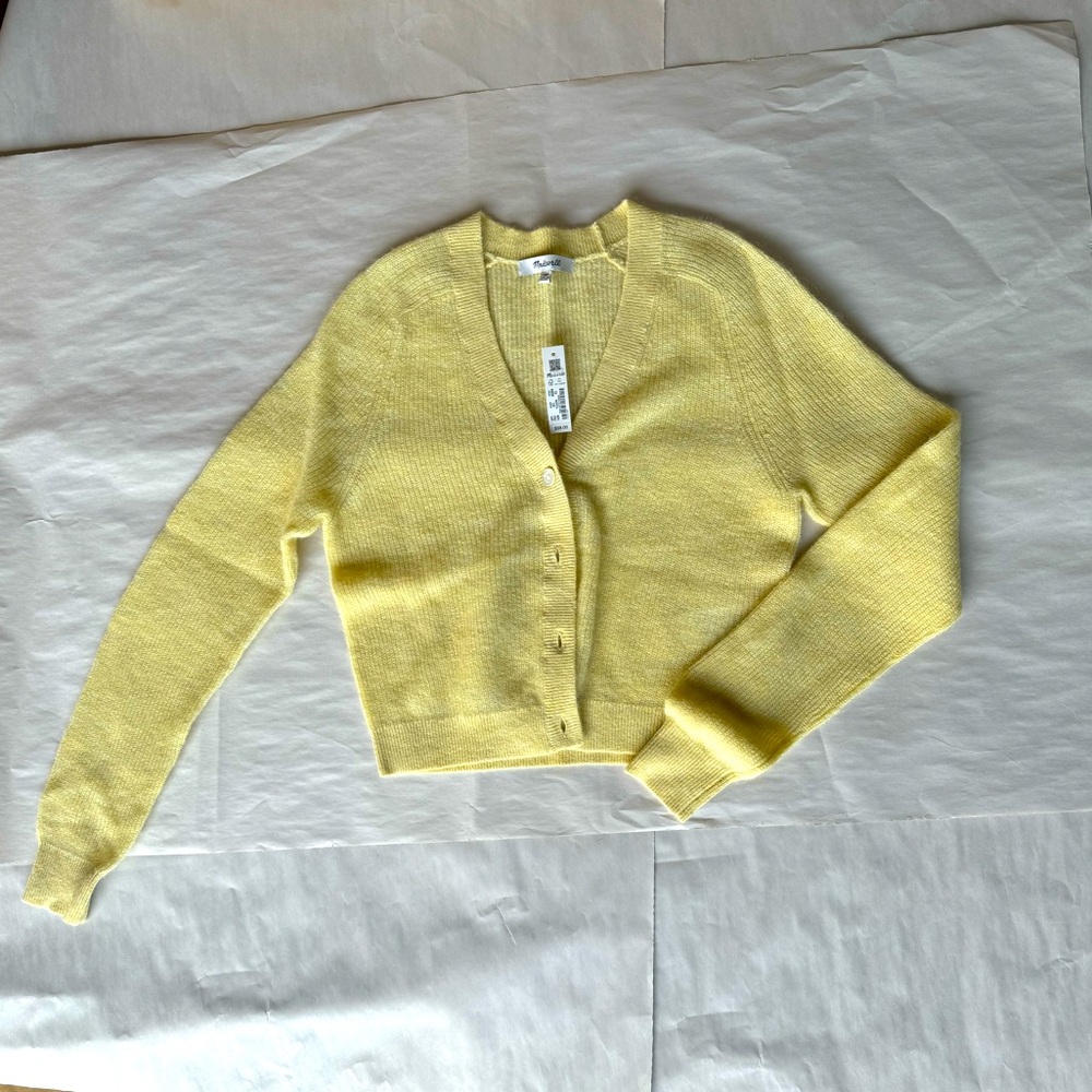 Woman’s buttoned down sweater